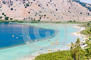 Beach in village Kavros in Crete island, Greece. Magical turquoise waters, lagoons.