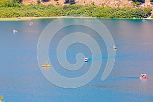 Beach in village Kavros in Crete island, Greece. Magical turquoise waters, lagoons.