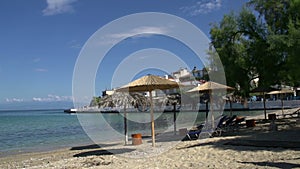 Beach and village in skala marion Thassos Greece