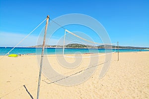 Beach volley net with surfboard