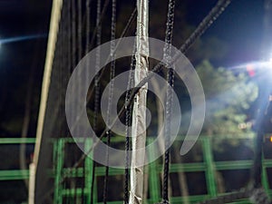 Beach volleyball court in the evening. Available infrastructure. Empty sports ground. Volleyball game concept. Sports mesh.