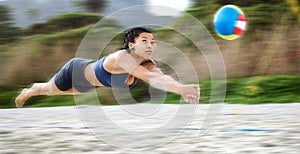 Beach volleyball, diving or sports girl playing a game in training or fitness workout in summer. Air jump, blurry dive