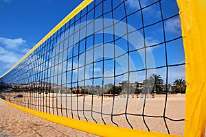 Beach volleyball net and beach