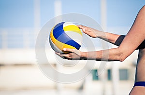 Beach volleyball player, playing summer. Woman with ball