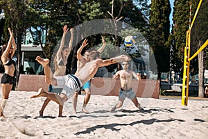 Beach volleyball players amateurs in action