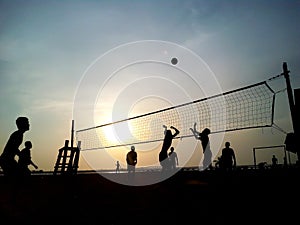 Beach volleyball sunset