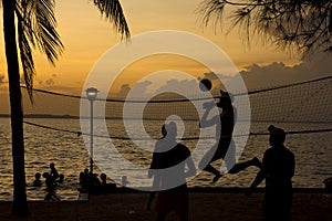 Beach volleyball, sunset on the beach