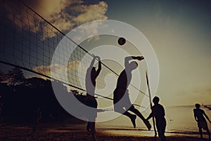 Beach Volleyball at Sunset Enjoyment Concept