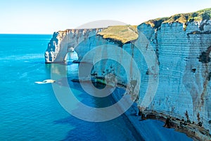 Beach walk on the beautiful alabaster coast near Ãâ°tretat photo