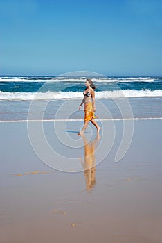 Beach walk woman