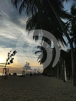 Beach walkway under sunset