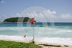 Beach warning red flags at Nai Harn beaches of Phuket