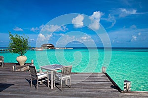 Beach with water bungalows  Maldives