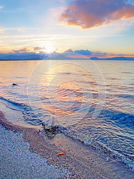 Beach, water and ocean view of blue sky and clouds at sunrise. Nature landscape of calm, stressless and peaceful sea in