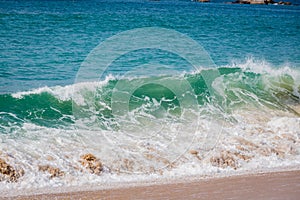 Beach waves on Acapulco Beach