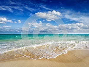 Beach and waves of Caribbean Sea