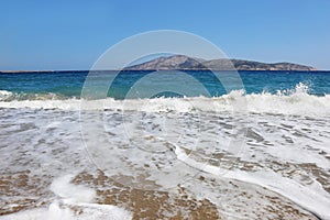 Beach waves at Kato Koufonisi island Cyclades Greece