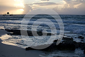 Beach and waves at sunrise on Riviera Maya