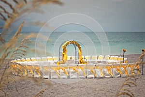 Beach Wedding Arch, Decorations and Chairs