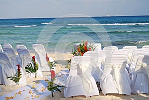 Beach wedding chairs awaiting guests
