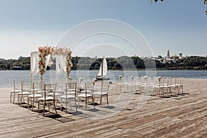 Beach Wedding Day Venue Arch Altar and Chairs