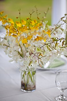Beach wedding decor table setting and flowers