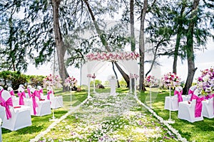 Beach Wedding Venue outdoor with the pine tree and the ocean background, Koh Samui, Thailand