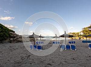 Beach with white sand and turquoise water of the Mediterranean sea in Alcudia, Mallorca, or Majorca, Balearic Islands, Spain