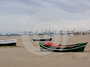 Beach in winter with boats on the sand to Valencia in Spain.