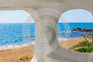 Beach at World's End Park, Sanya, China. View of the beautiful beach and sea from the white bungalow