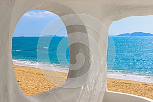 Beach at World's End Park, Sanya, China. View of the beautiful beach and sea from the white bungalow