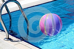 Beachball and swimmingpool photo