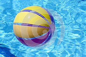 Beachball and swimmingpool.