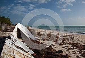 Beached Abandoned Boat Skiff on Isla Blanca peninsula on Cancun Bay Mexico
