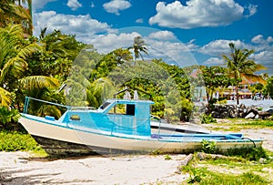 Beached Blue and White Fishing Boat