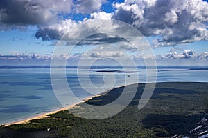 Beachs of french atlantic coastline with clouds sky and blue summer