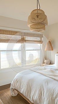 beachside bedroom with light, breezy decor, offering sweeping ocean vistas and incorporating natural materials for a photo