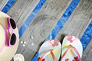 Beachwear on the pier at sea holiday vacation background