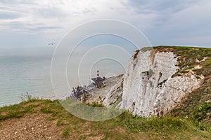 Beachy Head cliff down to the lighthouse when the tide is out.
