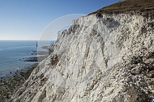 Beachy Head cliffs, East Sussex, England, the UK - the lighthouse and white cliffs.