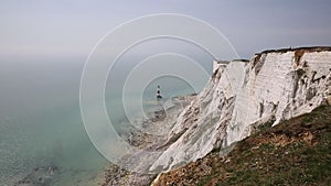 Beachy Head cliffs showing drop at notorious suicide place near Eastbourne East Sussex UK