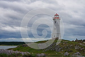 A beacon on a hill - Louisbourg Lighthouse in Nova Scotia photo