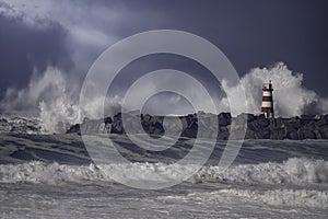 Beacon and pier under heavy storm