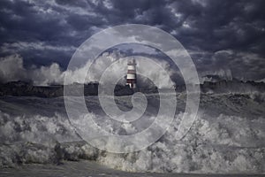 Beacon and pier under heavy storm