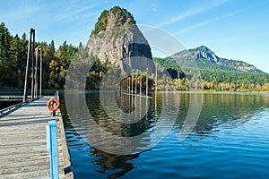 Beacon Rock and Hamilton Mountain reflected in water at Beacon Rock State Park, Washington, USA