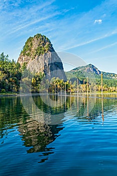 Beacon Rock and Hamilton Mountain reflected in the waters of the Columbia River at Beacon Rock State Park, Washington, USA