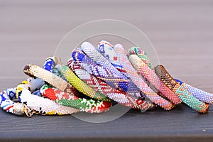 Beaded fashion Bracelets on a deck