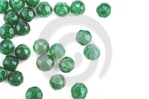 Beads made of natural green agate on a white background are isolated