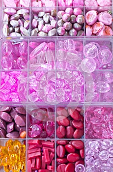 Beads and stones in boxes