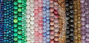 Beads from various types of natural stones on a thread